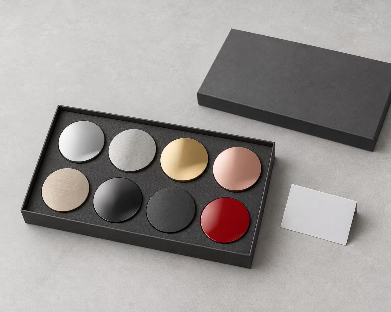 Finish sample kit: eight round samples in a graphite box
